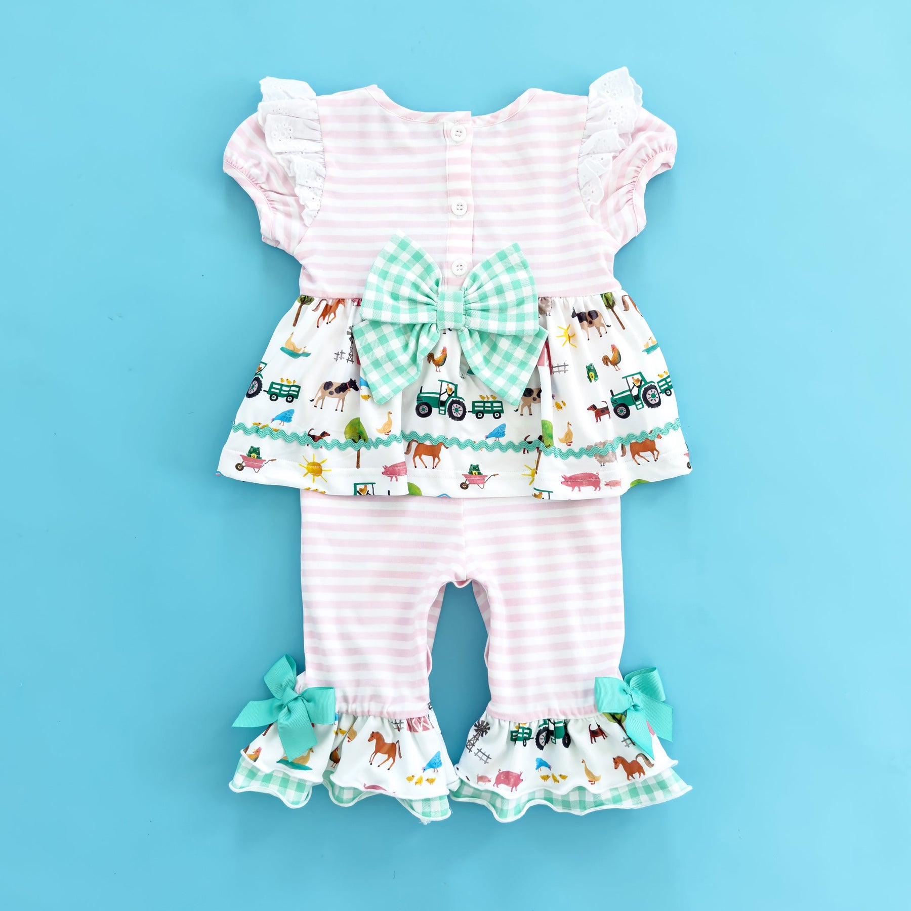 Girls Tractor Romper detail view by Seven Lantern Lane
