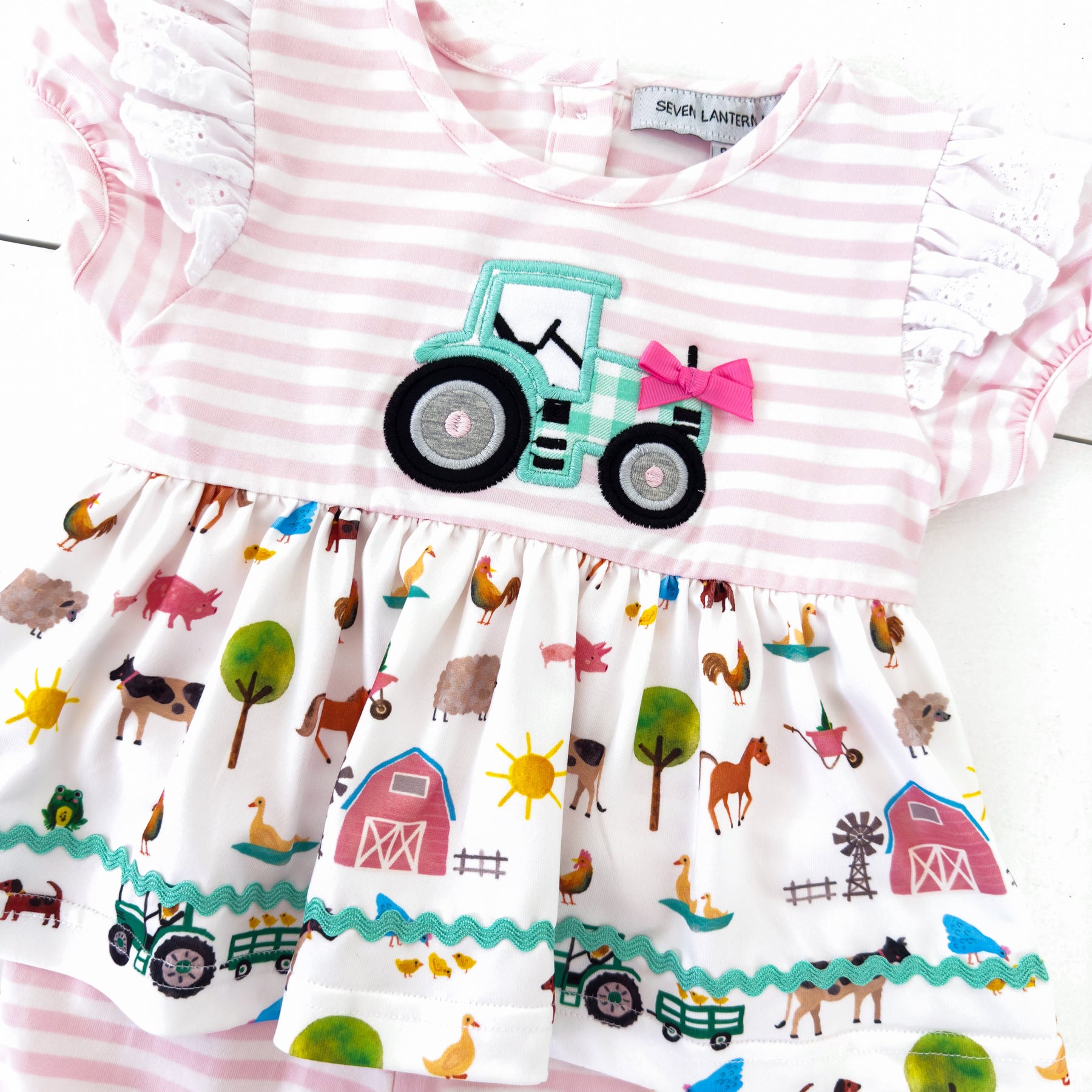 Girls Tractor Romper detail view by Seven Lantern Lane